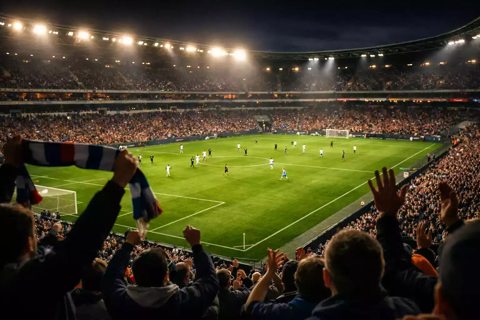 Stade de football avec supporters pendant un match de Ligue 1